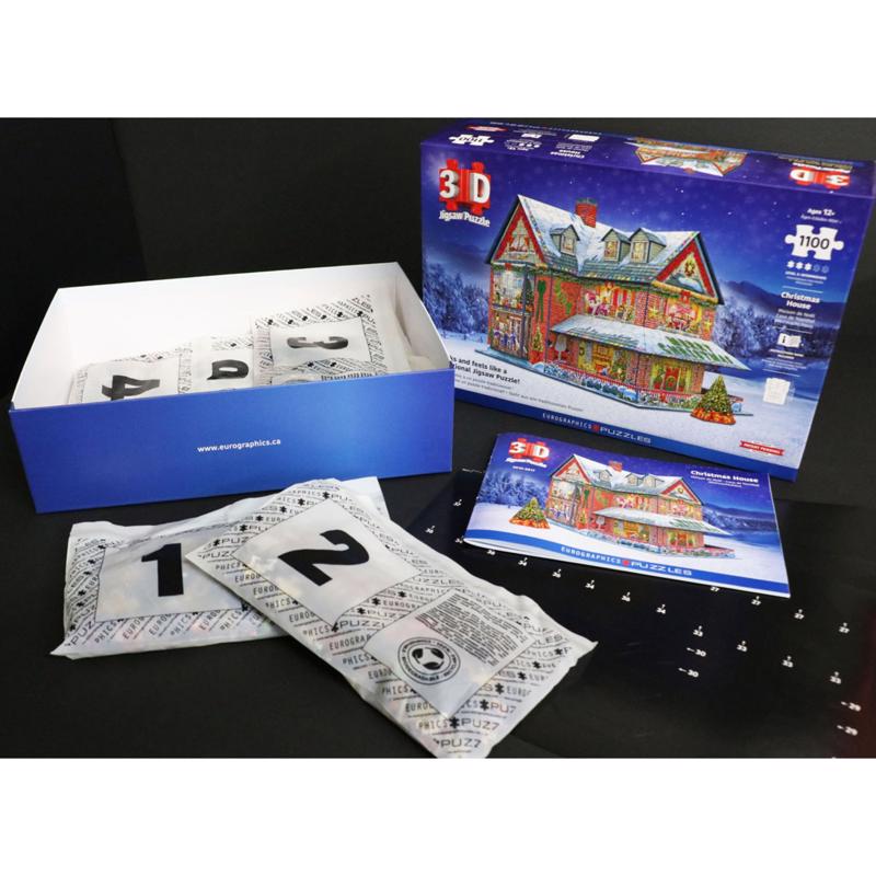 Rompecabezas 3D multicolor de casa navideña Eurographics de 1100 piezas